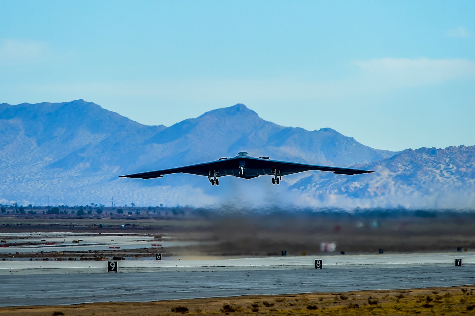 A B-2 Spirit stealth bomber takes off from Plant 42 in Palmdale, California, April 12, 2019. The Air Force’s B-2 fleet undergoes undergo programmed depot maintenance every nine years at the Northrop Grumman facility at Plant 42. (Photo courtesy of Alan Radecki/Northrop Grumman)