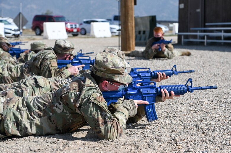 Airmen learn shooting stances during an expeditionary active shooter training course Sept. 25, 2020, at Hill Air Force Base, Utah. The course is one part of the Hill Expeditionary Airman Readiness Training program, or HEART, where first-term Airmen are trained with basic readiness skills. (U.S. Air Force photo by Cynthia Griggs)