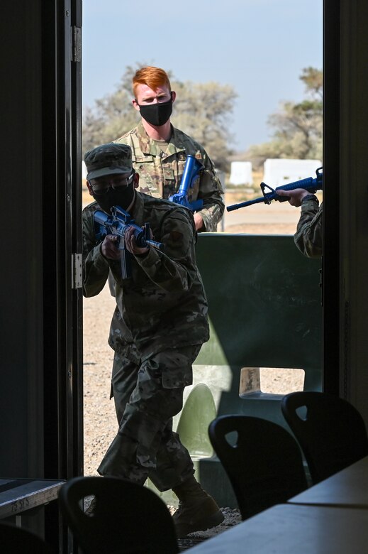 Staff Sgt. Matthew Kopf, 75th Security Forces, instructs Airmen how to search a room during an expeditionary active shooter training course Sept. 25, 2020, at Hill Air Force Base, Utah. The course is one part of the Hill Expeditionary Airman Readiness Training program, or HEART, where first-term Airmen are trained with basic readiness skills. (U.S. Air Force photo by Cynthia Griggs)