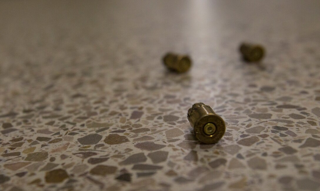 Bullet casings lay on the ground after an active shooter drill at Marine Corps Air Station Cherry Point, North Carolina, Sept. 23, 2020. The exercise simulated an active shooter threat in order to better prepare base personnel in case of a real world scenario. (U.S. Marine Corps photo by Lance Cpl. Jacob Bertram)