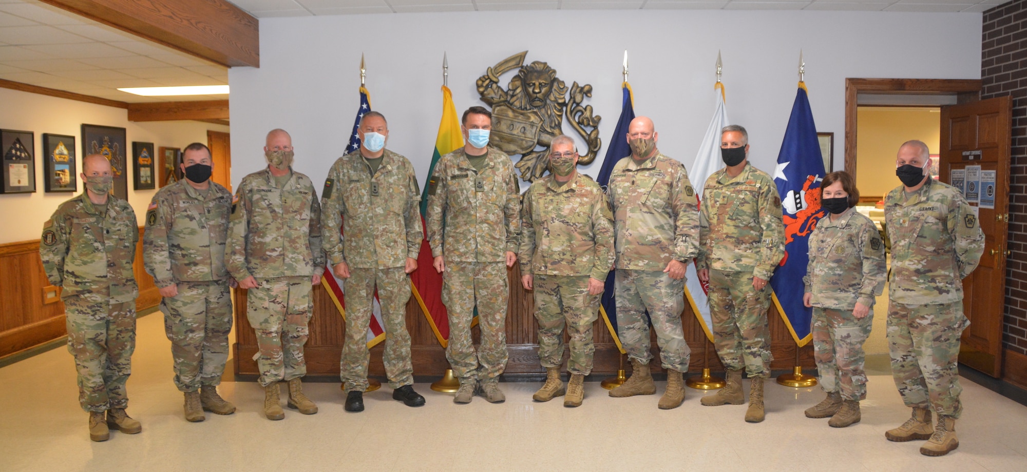 Pennsylvania adjutant general Maj. Gen. Anthony Carrelli, center right, and the defense attaché from the Lithuanian Embassy in Washington, D.C., Brig. Gen. Modestas Petrauskas, center left, are joined by other PNG and Lithuanian leaders Sept. 28, 2020, at Fort Indiantown Gap, Pa. This was Petrauskas’ first visit to Pennsylvania, as COVID-19 restrictions prevented additional travel since he took his post earlier this year.