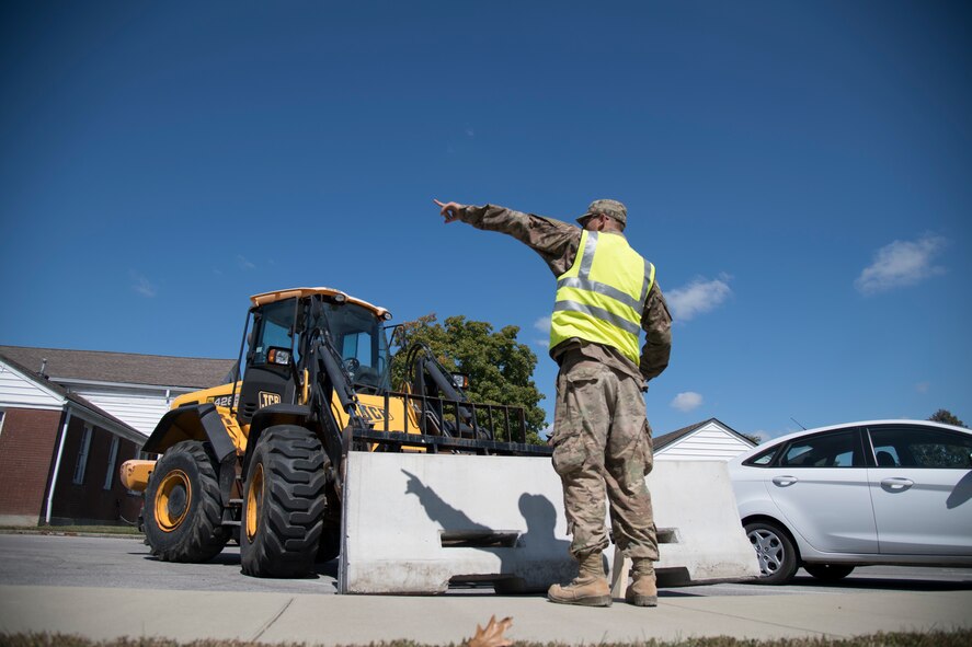 U.S. Air Force Airmen use heavy equipment