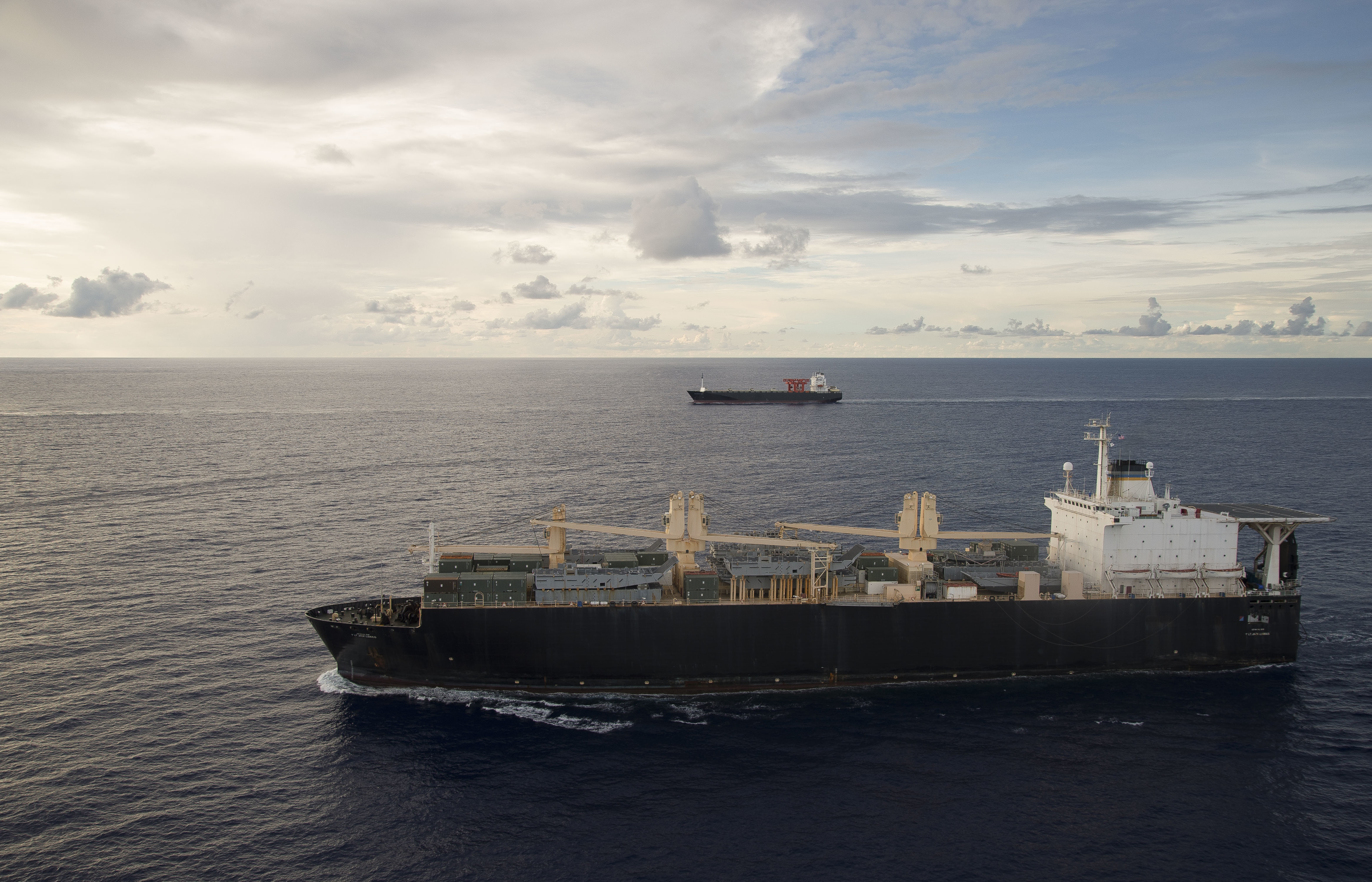 USNS 1st LT Jack Lummus (T-AK 3011) executes a Group Sail with Maritime Prepositioning Ships Squadron (MPSRON 3) off the coast of Guam, Oct. 4, 2017.