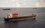 USNS MV Maj. Bernard F. Fisher (T-AK 4396) executes a Group Sail with Maritime Prepositioning Ships Squadron (MPSRON 3) off the coast of Guam, Oct. 4, 2017.