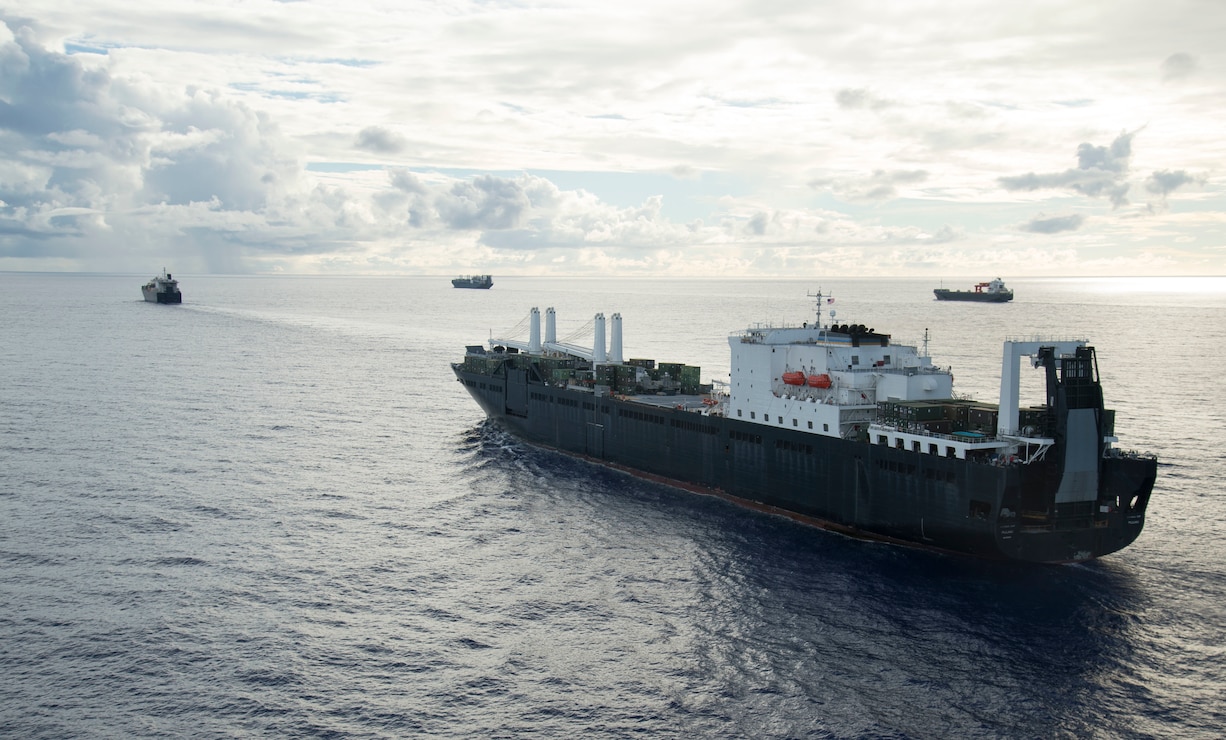 USNS Pililaau (T-AK 304) executes a Group Sail with Maritime Prepositioning Ships Squadron (MPSRON 3) off the coast of Guam, Oct. 4, 2017.