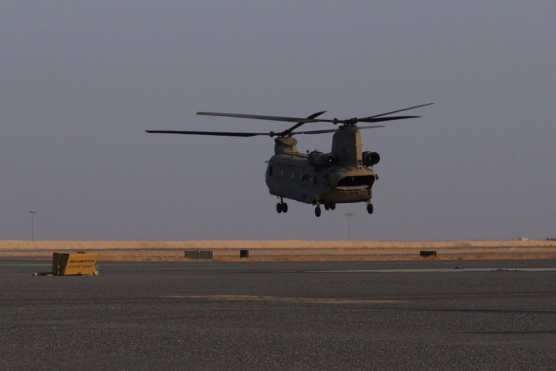 A CH-47 Chinook helicopter, operated by Soldiers with Bravo Company, 2-104th General Support Aviation Battalion, 28th Expeditionary Combat Aviation Brigade takes off from an airfield for a local area orientation flight in the 28th ECAB's area of operations after arriving in the Middle East. These flights ensure 28th ECAB aircrews are properly acclimated and can conduct missions safely during the deployment. (U.S. Army photo by Spc. Jose Brown)