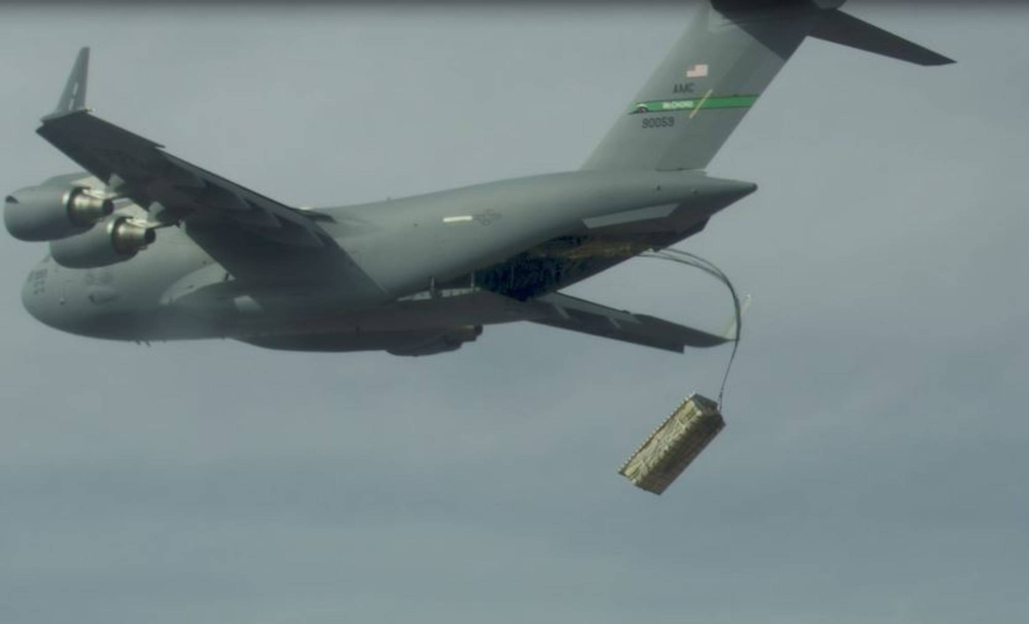 A high altitude airdrop of palletized munitions (JASSM simulants) from a C-17 using standard operational airdrop procedures was conducted during the Air Force’s Advanced Battle Management Family of Systems (ABMS) Onramp #2 activities. (Courtesy photo)