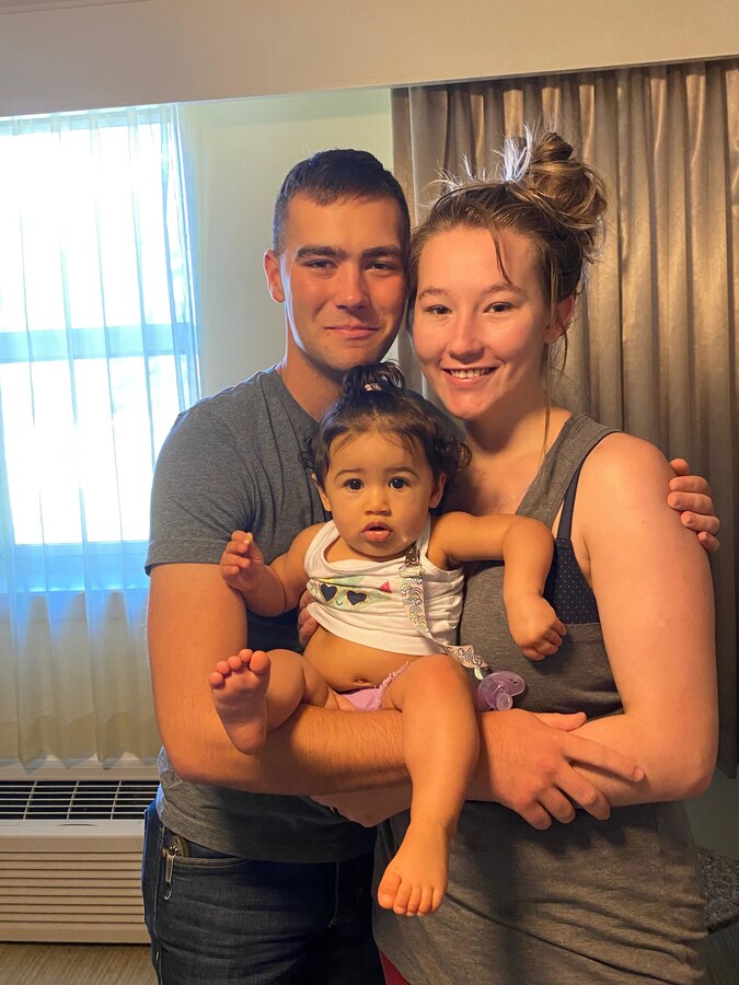 U.S. Marine Corps Pfc. Matthew T. Schulz, a student at the Center for Naval Aviation Technical Training, poses with his fiancée, Aleigha Breneman, and her daughter, Magnolia, at Marine Corps Air Station (MCAS) Cherry Point, North Carolina, July 5, 2020. Breneman, his fiancée, and her daughter, Magnolia, have been staying with his parents in Iowa. They were able to make a three day trip down to MCAS Cherry Point to visit, but unfortunately he was not able to leave base. (U.S. Marine Corps Courtesy photo by Pfc. Matthew T. Schulz)