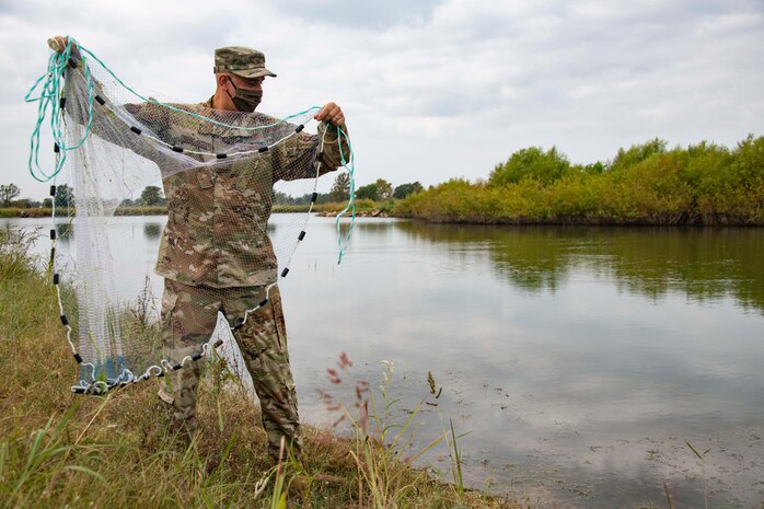 man holds net