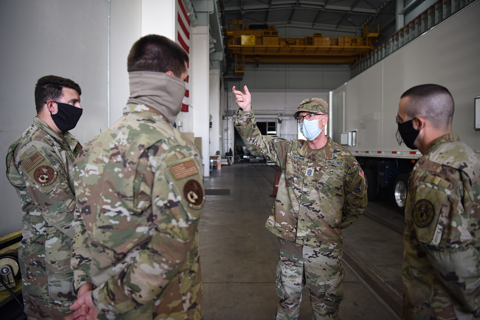 Chief Master Sgt. Roger A. Towberman, U.S. Space Force senior enlisted advisor, speaks with Airmen assigned to the 2nd Space Launch Squadron Sept. 23, 2020, at Vandenberg Air Force Base, Calif. The 2 SLS ‘Space Cowboys’ briefed Towberman on current operations, upcoming launches, and their key role in the space warfighting mission. (U.S. Space Force photo by Senior Airman Hanah Abercrombie)