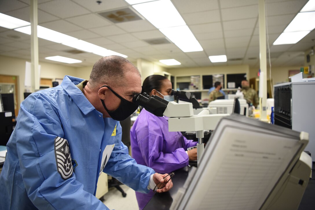 Chief Master Sgt. Roger A. Towberman, U.S. Space Force senior enlisted advisor, visits the 30th Medical Group Sept. 24, 2020, at Vandenberg Air Force Base, Calif. Airmen from across the 30th MDG briefed Towberman on the innovative medical capabilities the unit has used to support U.S. Air Force and U.S. Space Force professionals across the installation. The Airmen demonstrated their current COVID-19 testing capabilities, in addition to their air quality assessments, which areused as a precaution due to the California wildfires that have elevated the base’s Air Quality Index. (U.S. Space Force photo by Senior Airman Hanah Abercrombie)