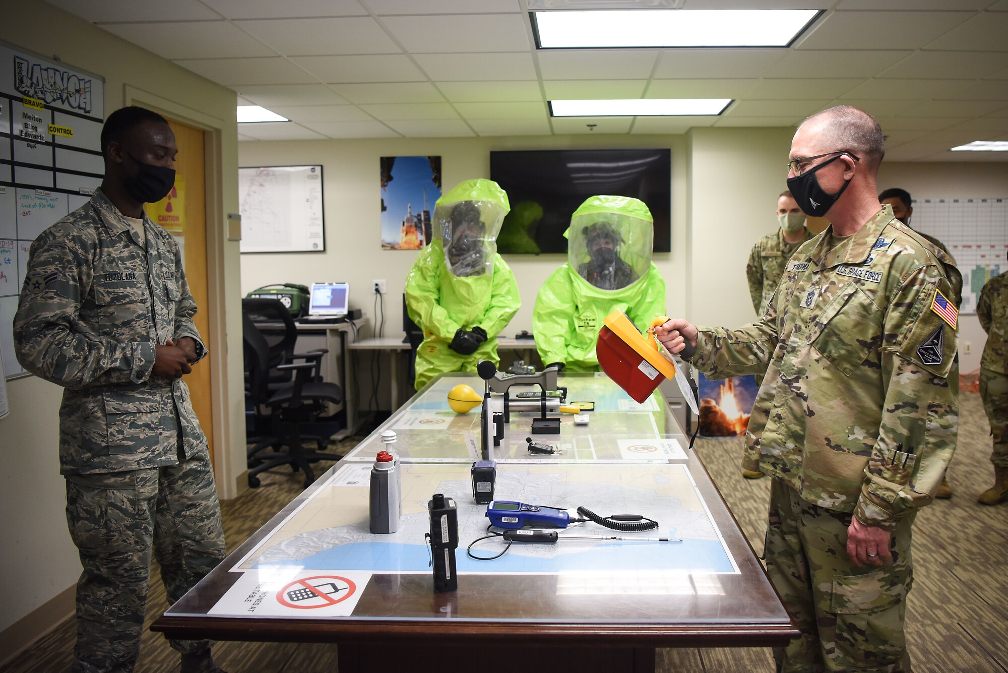 Chief Master Sgt. Roger A. Towberman, U.S. Space Force senior enlisted advisor, visits the 30th Medical Group Sept. 24, 2020, at Vandenberg Air Force Base, Calif. Airmen from across the 30th MDG briefed Towberman on the innovative medical capabilities the unit has used to support U.S. Air Force and U.S. Space Force professionals across the installation. The Airmen demonstrated their current COVID-19 testing capabilities, in addition to their air quality assessments, which are used as a precaution due to the California wildfires that have elevated the base’s Air Quality Index. (U.S. Space Force photo by Senior Airman Hanah Abercrombie)