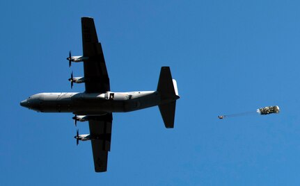 Texas National Guard Paratroopers from the 197th Special Troops Support Company, 36th Sustainment Brigade, jump out of a C-130 aircraft over Joint Base San Antonio-Camp Bullis Sept. 25. Soldiers assigned to airborne units must complete a parachute jump every three months to maintain their airborne status.