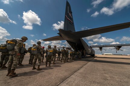 Texas Army National Guard soldiers assigned to the 197th Special Troops Support Company, Joint Base San Antonio-Camp Bullis, prepare for airborne operations training Sept. 25 at JBSA-Lackland. Soldiers loaded onto a C-130J Super Hercules, from the 317th Airlift Wing, Dyess AFB, Texas to complete static line jump training onto a drop zone at JBSA-Camp Bullis. Soldiers assigned to airborne units must complete a parachute jump every three months to maintain their airborne status.