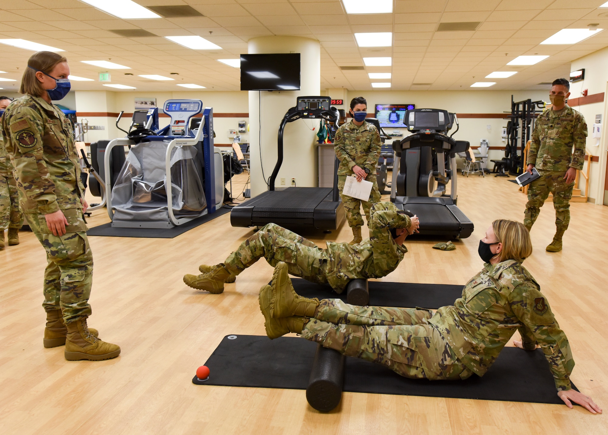 U.S. Air Force Airman 1st Class Hope Stegkamper, 673d Medical Operations Squadron physical therapy technician, briefs tools used during physical therapy to U.S. Air Force Col. Kirsten Aguilar, Joint Base Elmendorf-Richardson and 673d Air Base Wing commander, during a 673d MDOS immersion tour at JBER, Alaska, Sept. 24, 2020. Aguilar familiarized herself with the 673d MDOS and its role in supporting installation readiness after taking command of the installation on July 14, 2020. The 673d MDOS works to enhance the performance and overall health of JBER in order to ensure combat effectiveness. (U.S. Air Force photo by Senior Airman Crystal A. Jenkins)