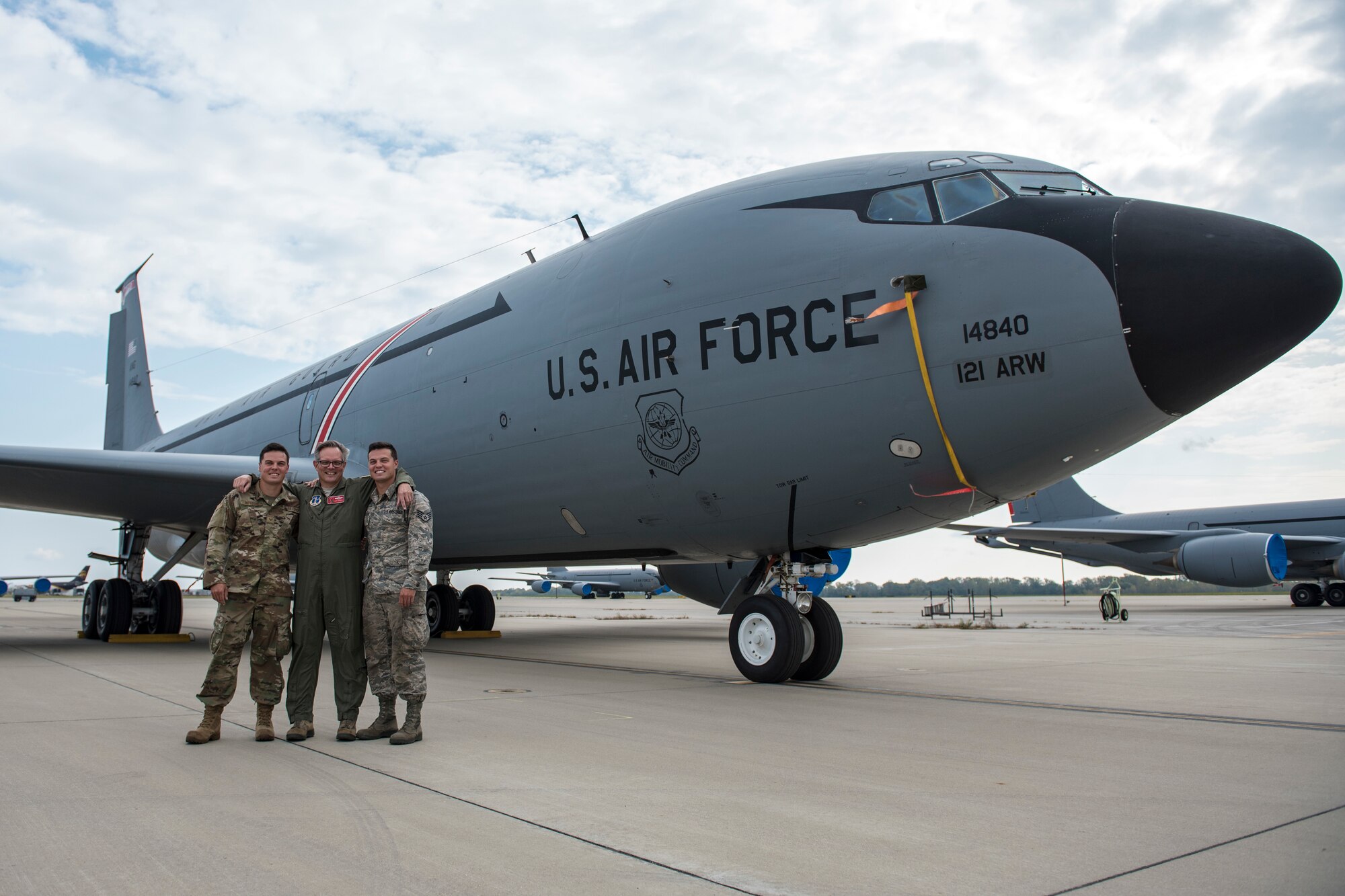 U.S. Air National Guard Lt. Col. Scott Notestine, a pilot with the 166th Air Refueling Squadron, 121st Air Refueling Wing, and Staff Sgt. Cody Notestine and Staff Sgt. Nick Notestine, aircraft metals technology specialists with the 121st Maintenance Squadron, 121st ARW, in front of a KC-135 Stratotanker on the flight line at Rickenbacker Air National Guard Base, Columbus, Ohio, Sep. 28, 2020. Lt. Col. Notestine retires Sep. 30 after 35 years of service, and his sons were recently selected to become pilots in the 121st ARW.