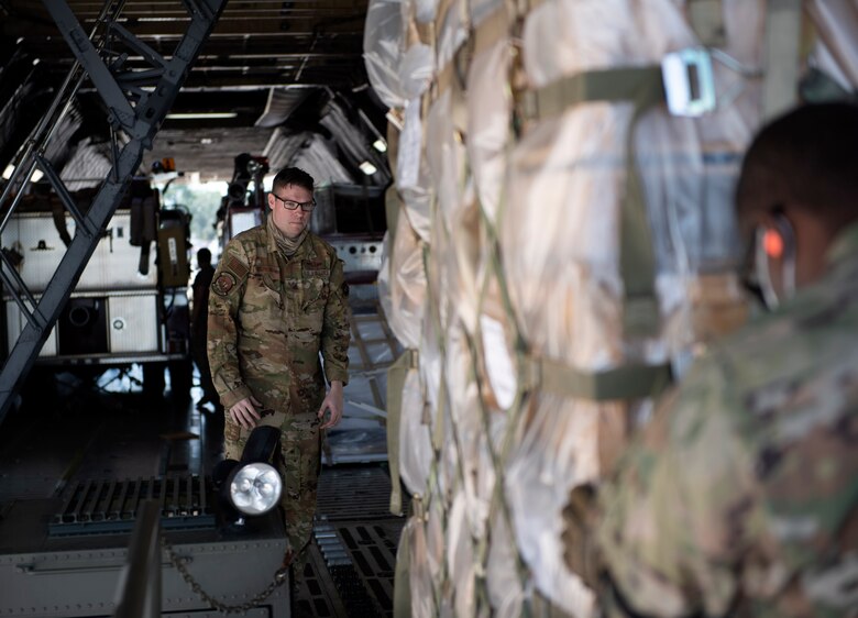 Photos of U.S. Airmen delivering humanitarian aid to Dominican Republic.