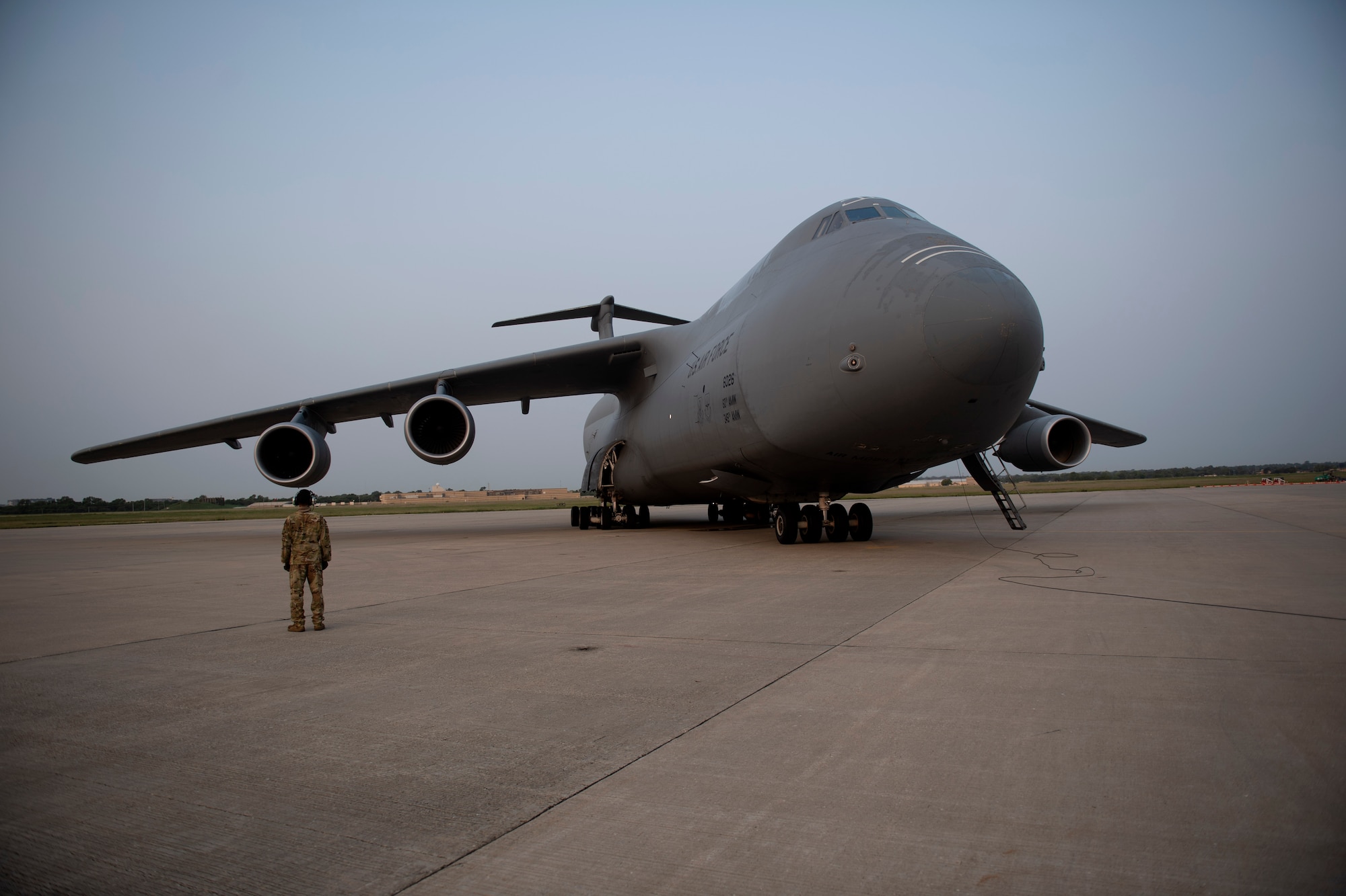 Photos of 22nd Airlift Squadron Airmen loading humanitarian aid at Travis AFB and delivering it to Guatemala.