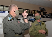 U.S. Air Force Gen. Mark Kelly, commander of Air Combat Command, talks with Royal Canadian Air Force Col. Sidney Connor, 601st Air Operations Center deputy commander, during a visit to Tyndall Air Force Base, Florida, Sept. 29, 2020.