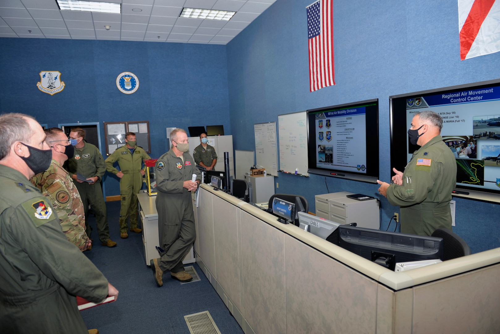 U.S. Air Force Lt. Col. Lewis Hagler, 601st Air Operations Center Air Mobility Division, briefs U.S. Air Force Gen. Mark Kelly, commander of Air Combat Command, on the AOC’s air mobility operations during a visit to Tyndall Air Force Base, Florida, Sept. 29, 2020.