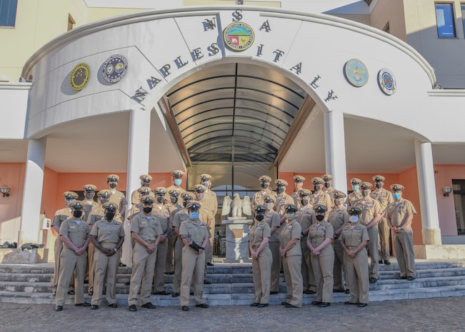 Chief Petty Officers pose for a photo on Naval Support Activity, Naples, Mar. 31, 2021, during a celebration of the 128th birthday of the Chief Petty Officer ranks.