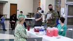 Wisconsin National Guard members assist with mobile vaccination team operations March 10, 2021, in Greendale, Wis. Citizen-Soldiers and -Airmen from the Wisconsin National Guard have helped local health departments administer more than 60,000 vaccinations across Wisconsin since establishing the first mobile vaccination teams in late January.