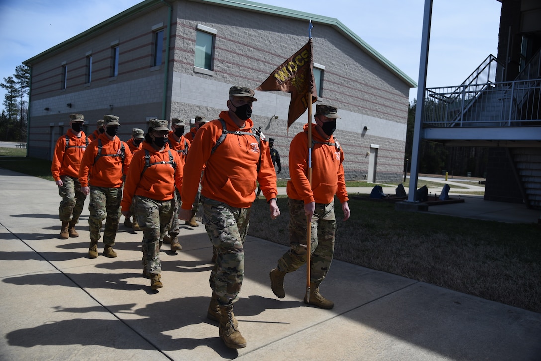 Warrant officer candidates enrolled in the Virginia National Guard’s Warrant Officer Candidate School present their class song and sign to Col. Charles B. Martin, commander of the 183rd Regiment, Regional Training Institute, March 20, 2021, at Fort Pickett, Virginia. The class includes both U.S. National Guard Soldiers from Virginia, Maryland and North Carolina, and U.S. Army Reserve Soldiers. The candidates will head south to Fort McClellan, Alabama, in at the end of April to begin Phase III and the final step toward becoming warrant officers. (U.S. Army National Guard photo by Sgt.1st Class Terra C. Gatti)