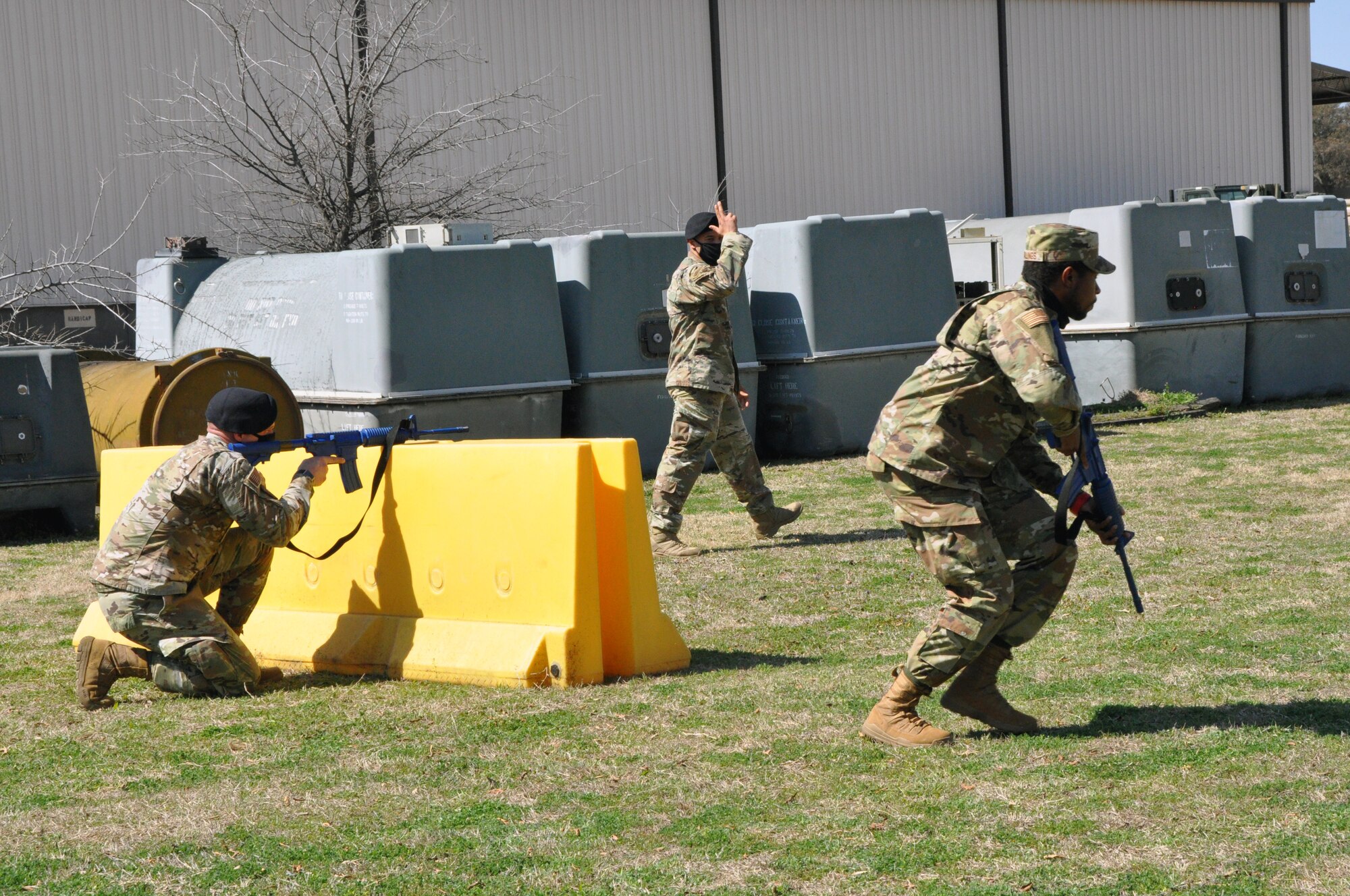 301st Fighter Wing Security Forces Squadron fire team members, (Left) Staff Sgt. Clay Wallace and (right) Staff Sgt. Ryan Gomas perform fire team movements during a field training exercise at U.S. Naval Air Station Joint Reserve Base Fort Worth, Texas on March 6, 2021. With SFS’s mission being to protect, defend and fight, Airmen must learn how to maneuver to, or away from a threat and communicate those movements with their team so that it can be done effectively and in a coordinated fashion. (U.S. Air Force photo by Senior Airman William Downs)