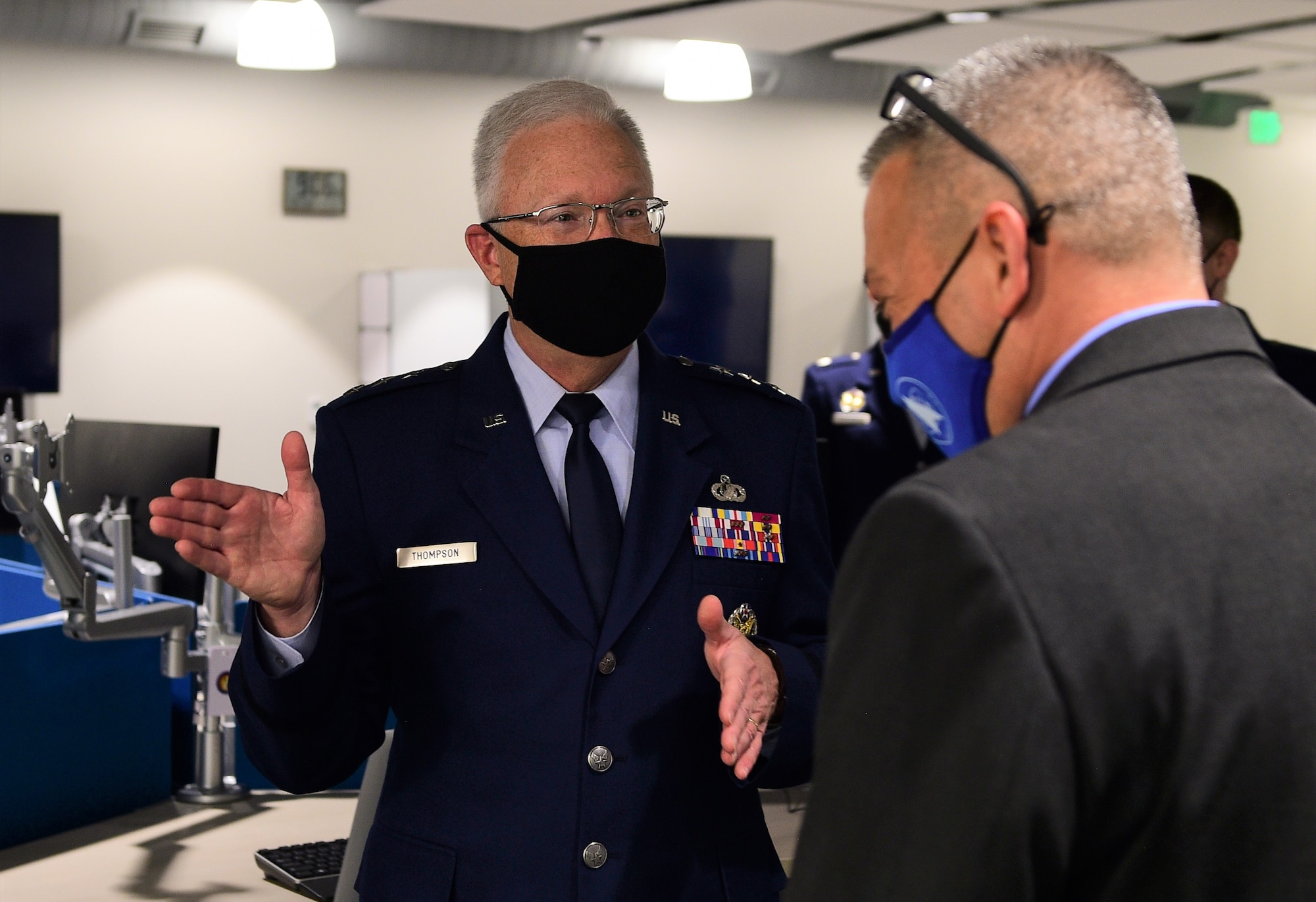 Lt. Gen. John F. Thompson, SMC commander and program executive officer for Space speaks to an attendee during the grand re-opening ceremony of  SMC’s newly renovated state-of-the-art TAP Lab on Mar. 31, 2021 in Boulder, Colo. (U.S. Space Force photo by Senior Airman Danielle McBride)