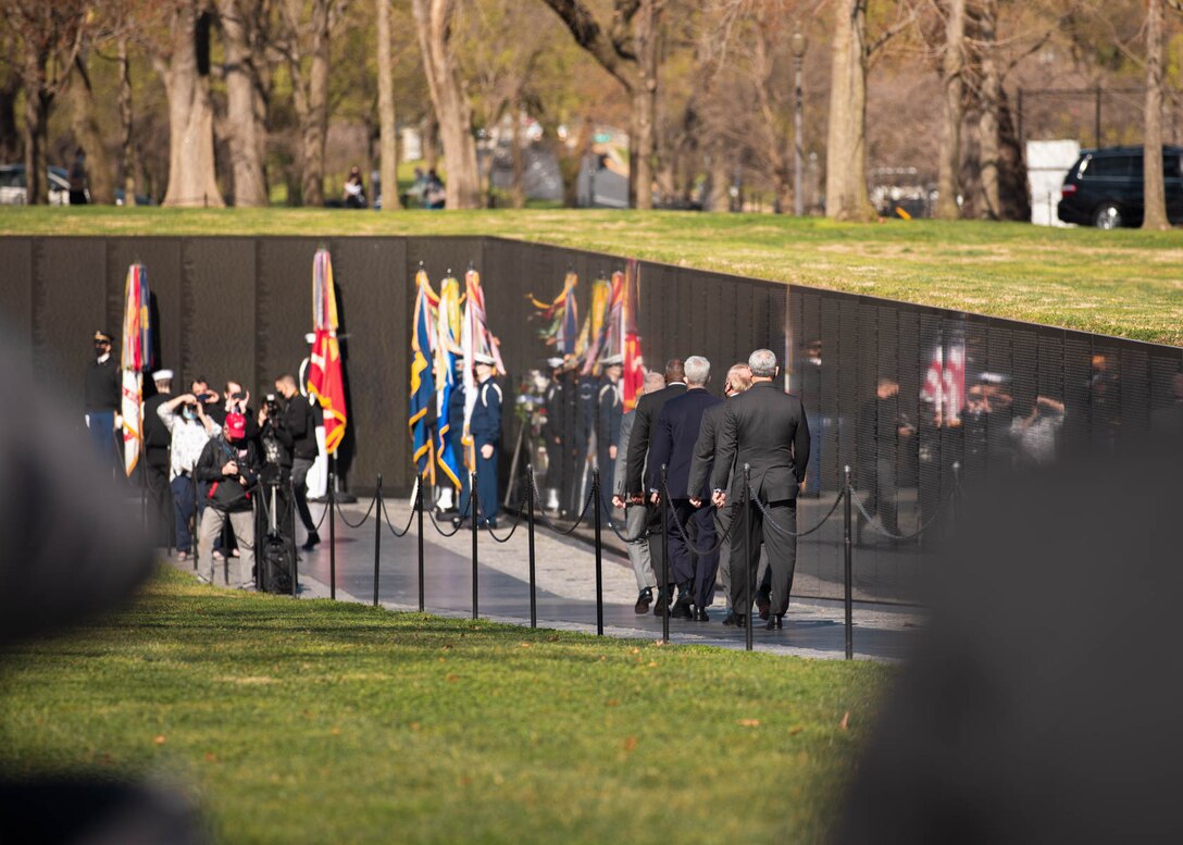 In recognition of National Vietnam War Veterans Day on Monday, March 29, 2021, Trumpet Player Gunnery Sgt. Benjamin Albright sounded "Taps" at the National Vietnam Veterans Memorial Wall in Washington, D.C. During the ceremony, Secretary of Defense Lloyd J. Austin III and Secretary of Veterans Affairs Denis R. McDonough laid a wreath in honor Vietnam War veterans.