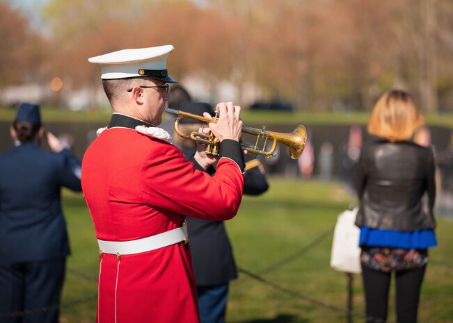 In recognition of National Vietnam War Veterans Day on Monday, March 29, 2021, Trumpet Player Gunnery Sgt. Benjamin Albright sounded "Taps" at the National Vietnam Veterans Memorial Wall in Washington, D.C. During the ceremony, Secretary of Defense Lloyd J. Austin III and Secretary of Veterans Affairs Denis R. McDonough laid a wreath in honor Vietnam War veterans.