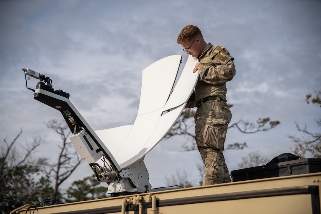 The Logistics Support Team with Golf Company, 2nd Marine Raider Support Battalion, unloads mission critical equipment during Training Exercise II at Marine Corps Auxiliary Landing Field Bogue, N.C., Dec. 4, 2020. This training allows the LST to be evaluated prior to attaching to a Marine Special Operations Company that, in turn, will be capable of supporting full-spectrum special operations. (U.S. Marine Corps photo by Cpl. Brennan Priest)