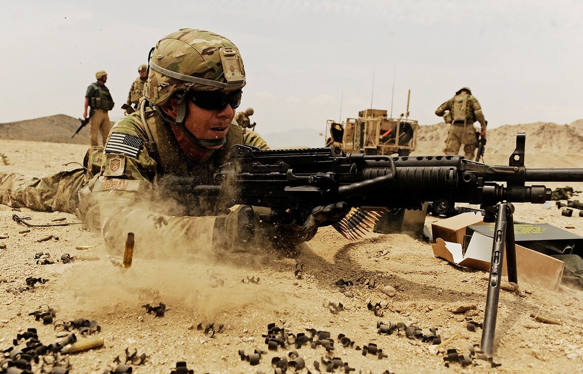 Defender fires weapon on a range