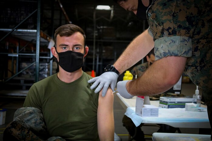 Marines and Sailors continue to receive the COVID-19 vaccine on Marine Corps Air Station Miramar, Calif., March 25, 2021. Vaccines are being administered in a phased approach, prioritizing health care workers and first responders, as well a mission critical and deploying personnel.