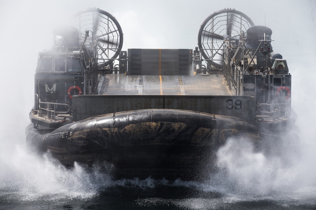 U.S. Navy Landing Craft, Air Cushion 39, attached to Assault Craft Unit 5, returns to the amphibious transport dock ship USS Somerset (LPD 25) after disembarking personnel and equipment assigned to the 15th Marine Expeditionary Unit, in the Gulf of Oman, March 23, 2021. Somerset, part of the Makin Island Amphibious Ready Group, and the 15th MEU are deployed to the U.S. 5th Fleet area of operations in support of naval operations to ensure maritime stability and security in the Central Region, connecting the Mediterranean and Pacific through the western Indian Ocean and three strategic choke points.