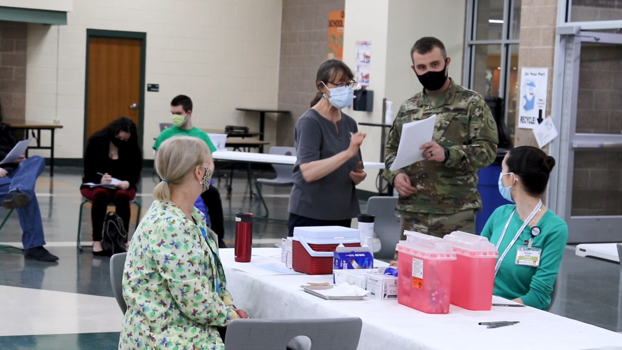 Wisconsin National Guard members assist with mobile vaccination team operations March 10, 2021, in Greendale, Wis. Citizen-Soldiers and -Airmen from the Wisconsin National Guard have helped local health departments administer more than 60,000 vaccinations across Wisconsin since establishing the first mobile vaccination teams in late January.