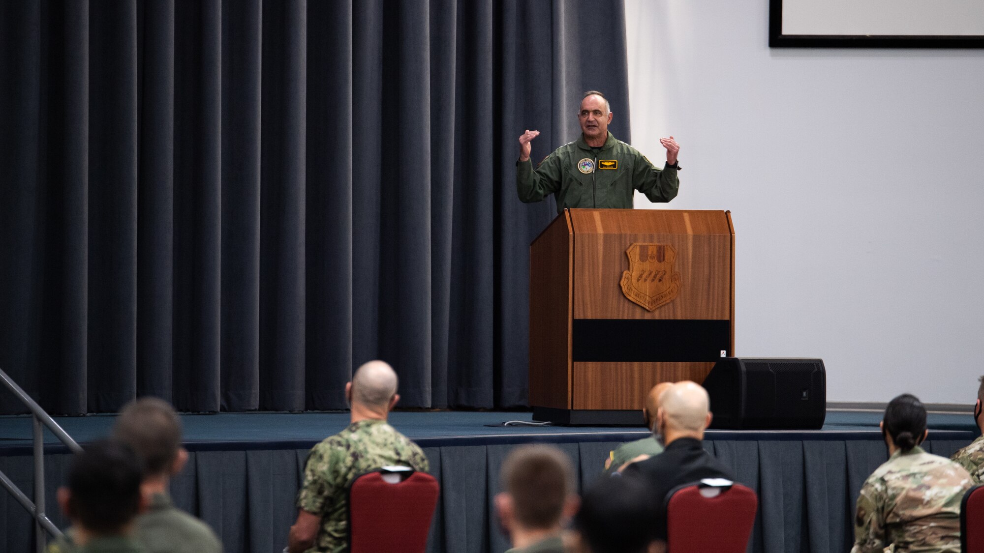 Adm. Charles Richard, U.S. Strategic Command commander, addresses the crowd during the presentation of the Omaha Trophy to the 96th Bomb Squadron at Barksdale Air Force Base, Louisiana, March 30, 2021. The Omaha Trophy is awarded each year to various units in recognition of outstanding support to USSTRATCOM's strategic deterrence mission. (U.S. Air Force photo by Airman 1st Class Jacob B. Wrightsman)