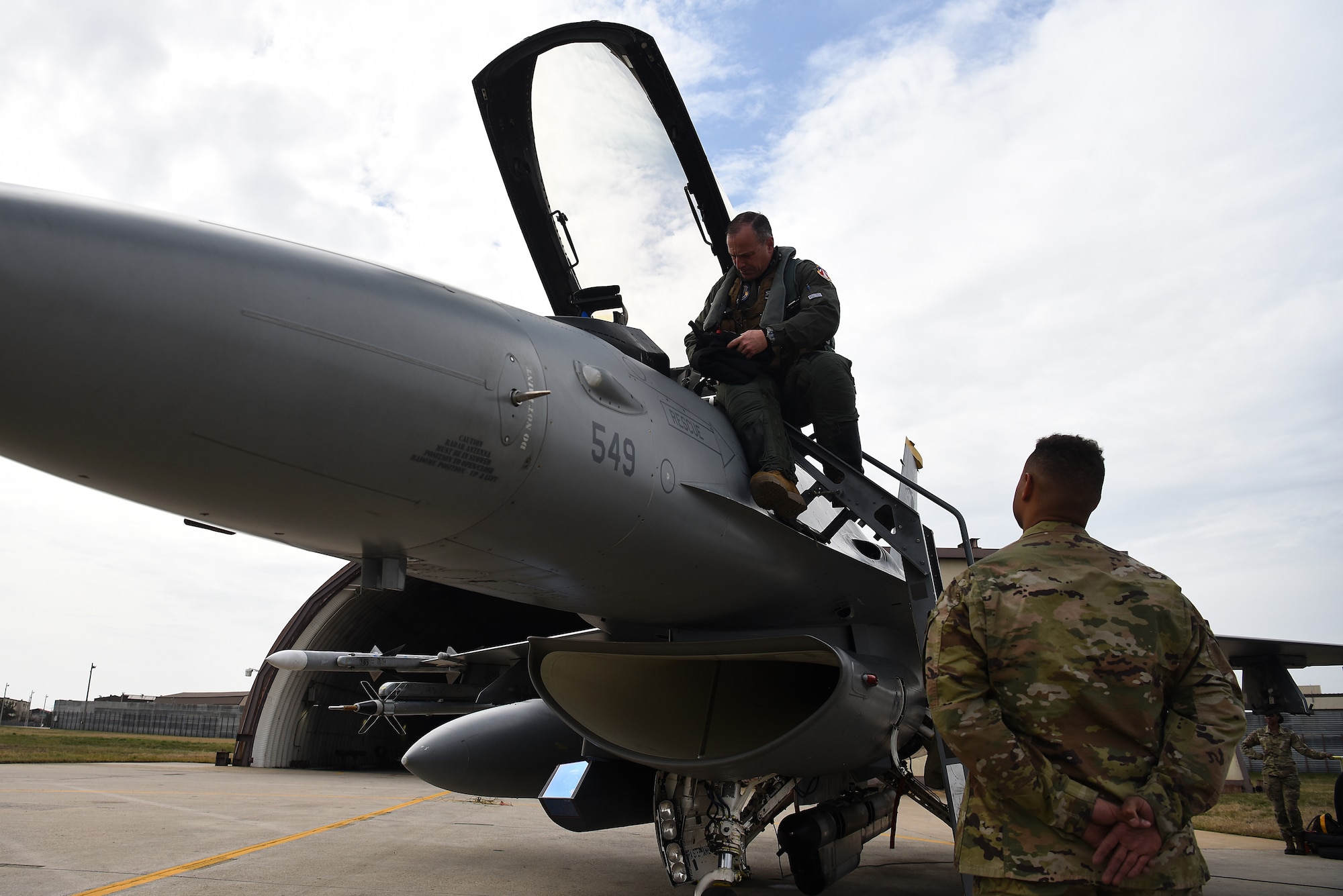 Lt. Gen. Scott Pleus, 7th Air Force commander, performs a preflight inspection on an F-16 Fighting Falcon with Senior Airman Mequail Fridge, 8th Aircraft Maintenance Squadron crew chief, on the flightline at Kunsan Air Base, Republic of Korea, April 1, 2021. During his visit, Pleus held a mentorship session with Kunsan’s company grade officers, toured the O’Malley Dining Facility, visited the fighter squadrons and more. (U.S. Air Force photo by Senior Airman Suzie Plotnikov)