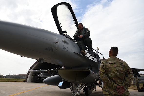 Lt. Gen. Scott Pleus, 7th Air Force commander, performs a preflight inspection on an F-16 Fighting Falcon with Senior Airman Mequail Fridge, 8th Aircraft Maintenance Squadron crew chief, on the flightline at Kunsan Air Base, Republic of Korea, April 1, 2021. During his visit, Pleus held a mentorship session with Kunsan’s company grade officers, toured the O’Malley Dining Facility, visited the fighter squadrons and more. (U.S. Air Force photo by Senior Airman Suzie Plotnikov)