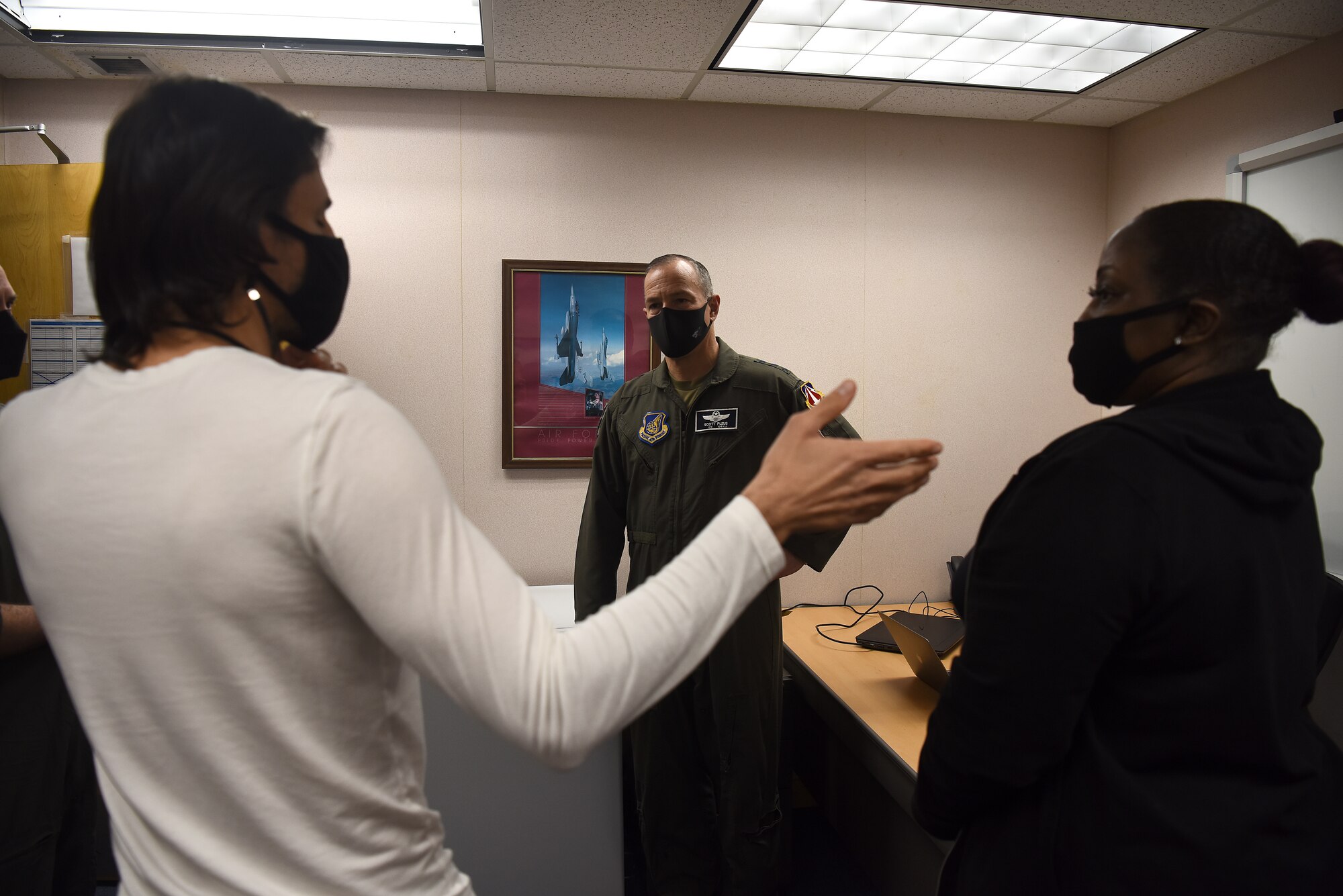 Rodrigo Almada, 35th Fighter Squadron athletic trainer, and Gayla Spencer, 8th Operations Group licensed massage therapist, brief Lt. Gen. Scott Pleus, 7th Air Force commander, about their role in the squadron’s initiative to optimize the human weapon system at Kunsan Air Base, Republic of Korea, March 31, 2021. During his visit, Pleus held a mentorship session with Kunsan’s company grade officers, toured the O’Malley Dining Facility, visited the fighter squadrons and more. (U.S. Air Force photo by Senior Airman Suzie Plotnikov)
