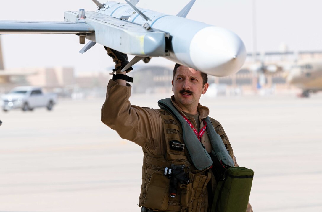 Capt. Brandon Schoenfeldt, 77th Expeditionary Fighter Squadron pilot, prepares for a flight March 26, 2021, at Prince Sultan Air Base, Kingdom of Saudi Arabia.
