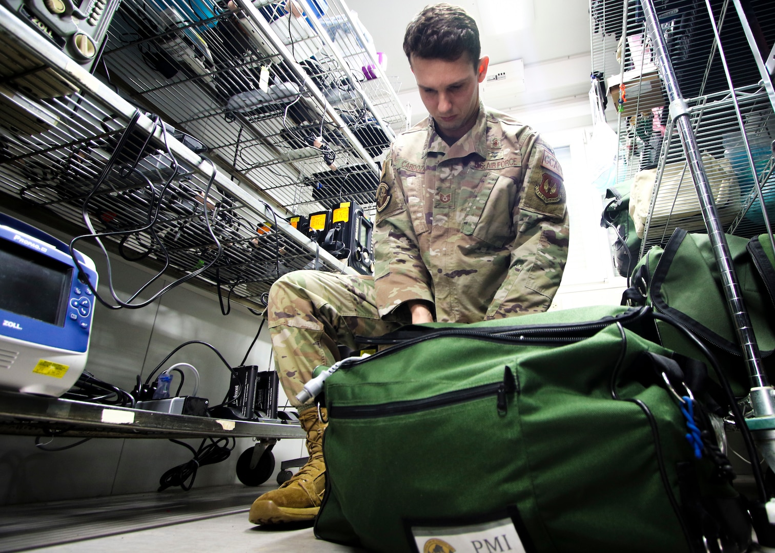 U.S. Air Force Tech Sgt. Adam Cardoza, Noncommissioned Officer in charge, Pulmonary Clinic, Landstuhl Regional Medical Center, performs a preflight inspection on equipment as part of the 86th Medical Squadron’s Critical Care Air Transport Team operations, March 23. Cardoza, a native of Dana Point, California, was recognized as the Air Force’s top Cardiopulmonary Laboratory Noncommissioned Officer of the Year of 2020.