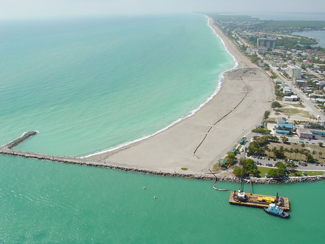 Photo of Fort Pierce South Jetty and beach; Corps of Engineers will place sand along a 1.3-mile stretch of beach south of the Fort Pierce jetty beginning in mid-April.