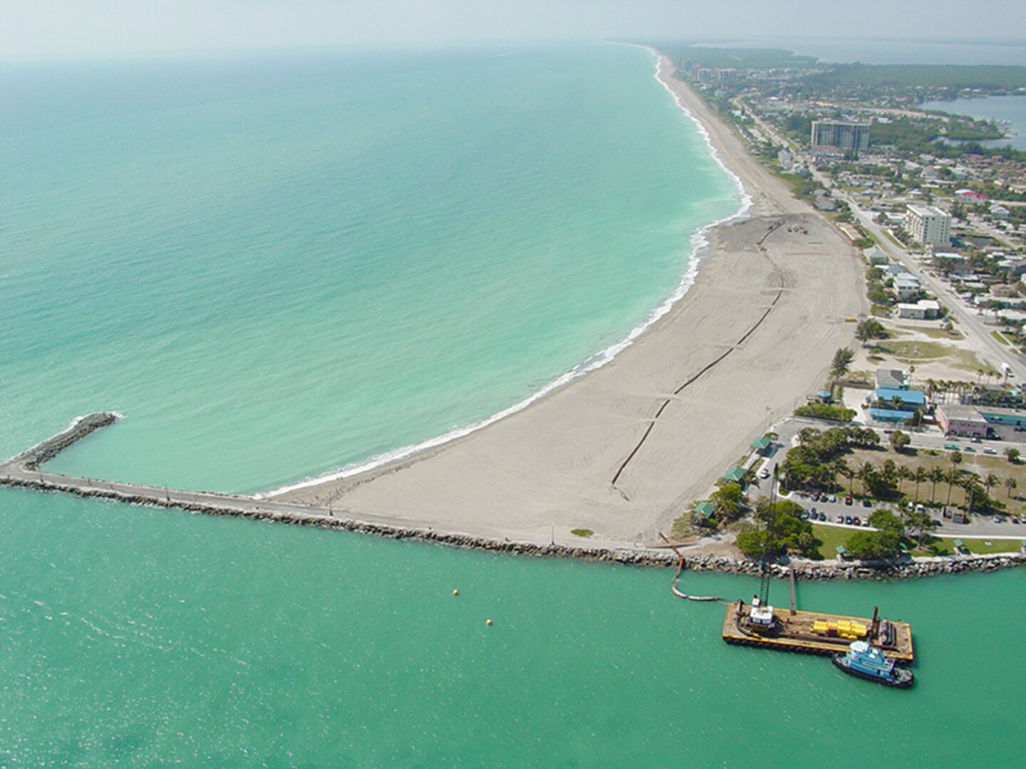Photo of Fort Pierce South Jetty and beach; Corps of Engineers will place sand along a 1.3-mile stretch of beach south of the Fort Pierce jetty beginning in mid-April.