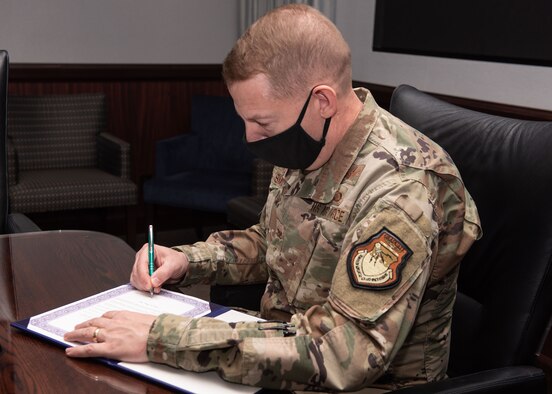 Peterson-Schriever Garrison commander signs Month of the Military Child Proclamation