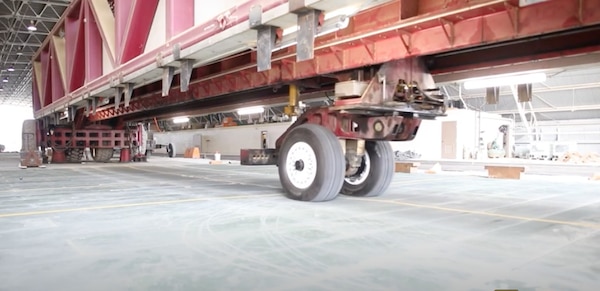 The U.S. Army Corps of Engineers Research and Development Center's Geotechnical and Structures Laboratory uses a Heavy Vehicle-load Simulator-Aircraft system to test AM2 matting for the U.S. Navy's P-8 Poseidon aircraft in March 2021 at the Waterways Experiment Station in Vicksburg, Mississippi.