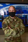 Air Force Major poses for photo