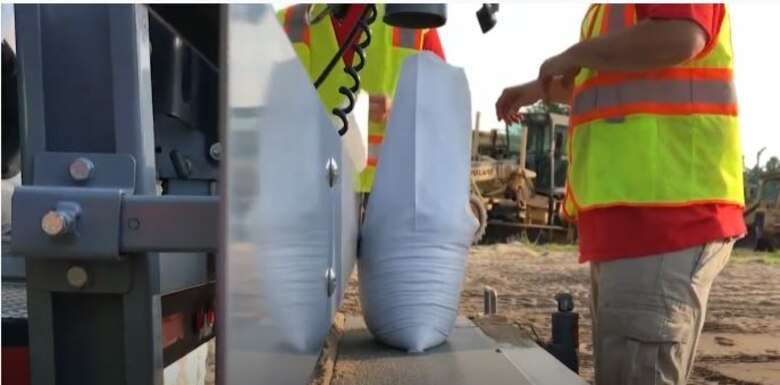 sandbag sitting on a conveyor belt