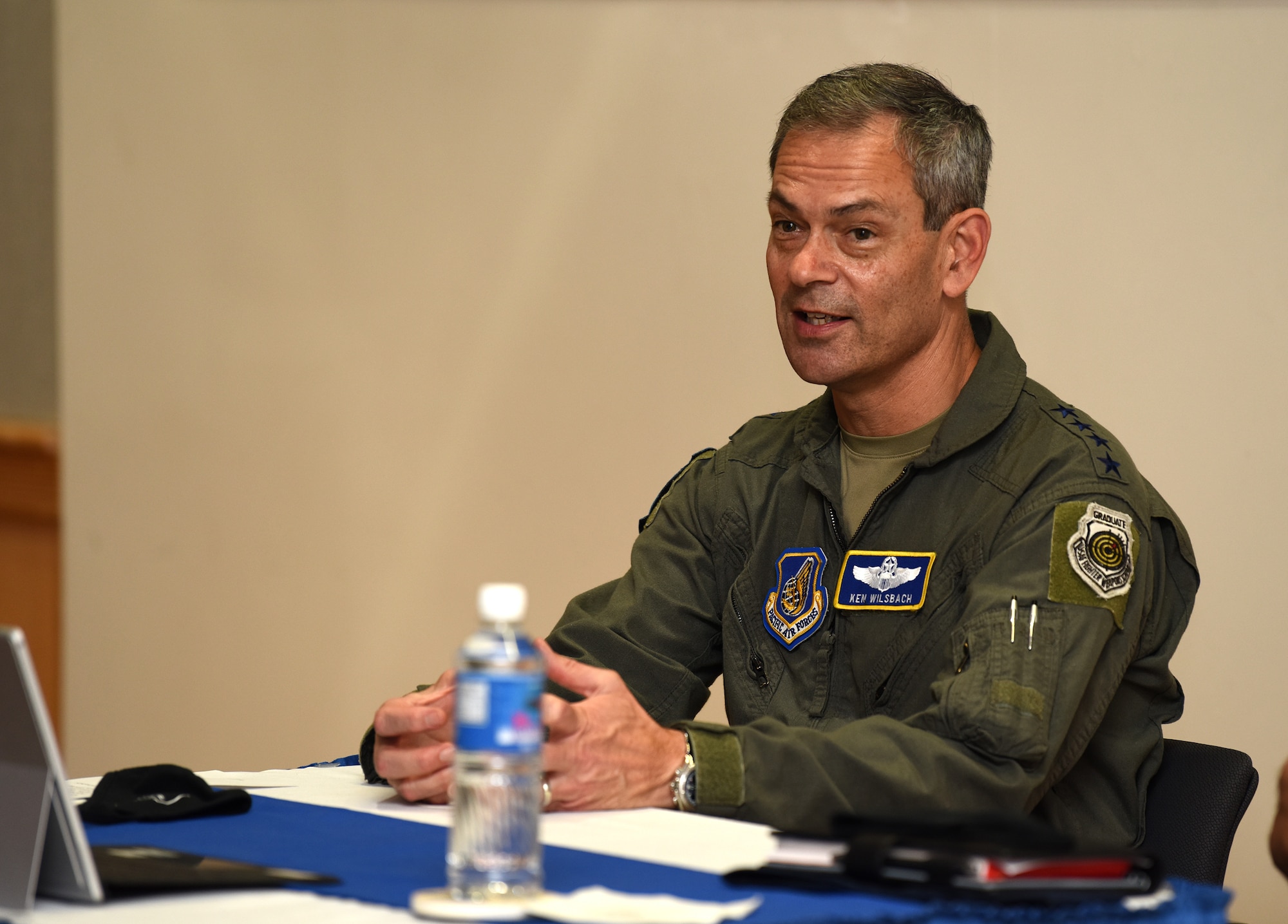 U.S. Air Force Gen. Ken Wilsbach, Pacific Air Forces (PACAF) commander, discuss command priorities with Airmen from around the Pacific during Pacific Paladin at the Aloha Conference Center, Joint Base Pearl Harbor-Hickam, Hawaii, March 31, 2021. Pacific Paladin, a new PACAF professional development platform focused on mentoring staff sergeants through senior master sergeants, bridging the gap between the tactical, operational and strategic level of performance. More than 200 Airmen from nine PACAF installations attended the seminar in-person and virtually. (U.S. Air Force photo by Tech. Sgt. Zachary Vaughn)