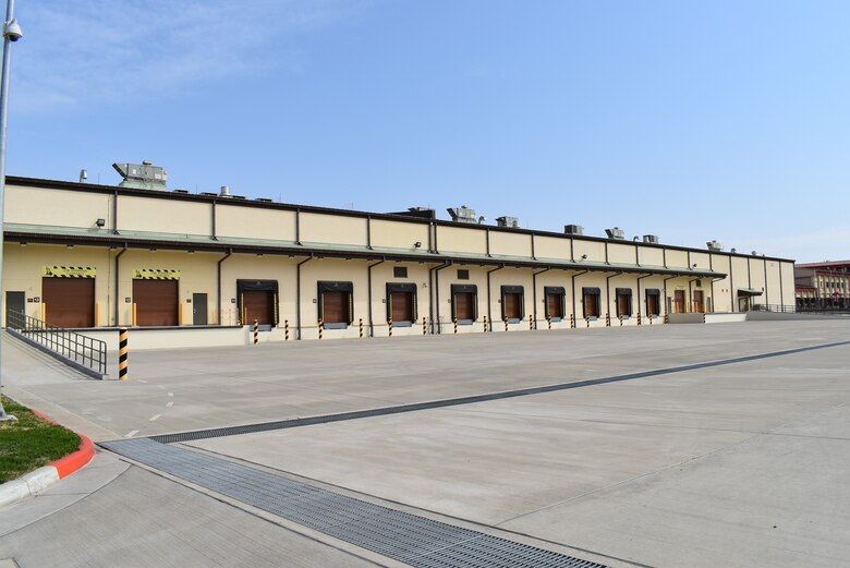 Captured is the new Army storage warehouse staging and loading docks, which was turned over to Col. Garrett Cottrell, Deputy Commanding Officer - Transformation, U.S. Army Corps of Engineers Far East District, on behalf of the U.S. government by Col. Pyo In Tae, ROK Design and Construction Agent, on behalf of the ROK government during the Acceptance Release Letter signing at USAG Humphreys, Republic of Korea, Apr. 2, 2021.